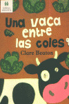 UNA VACA ENTRE LAS COLES