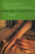 MUJER ENSIMISMADA